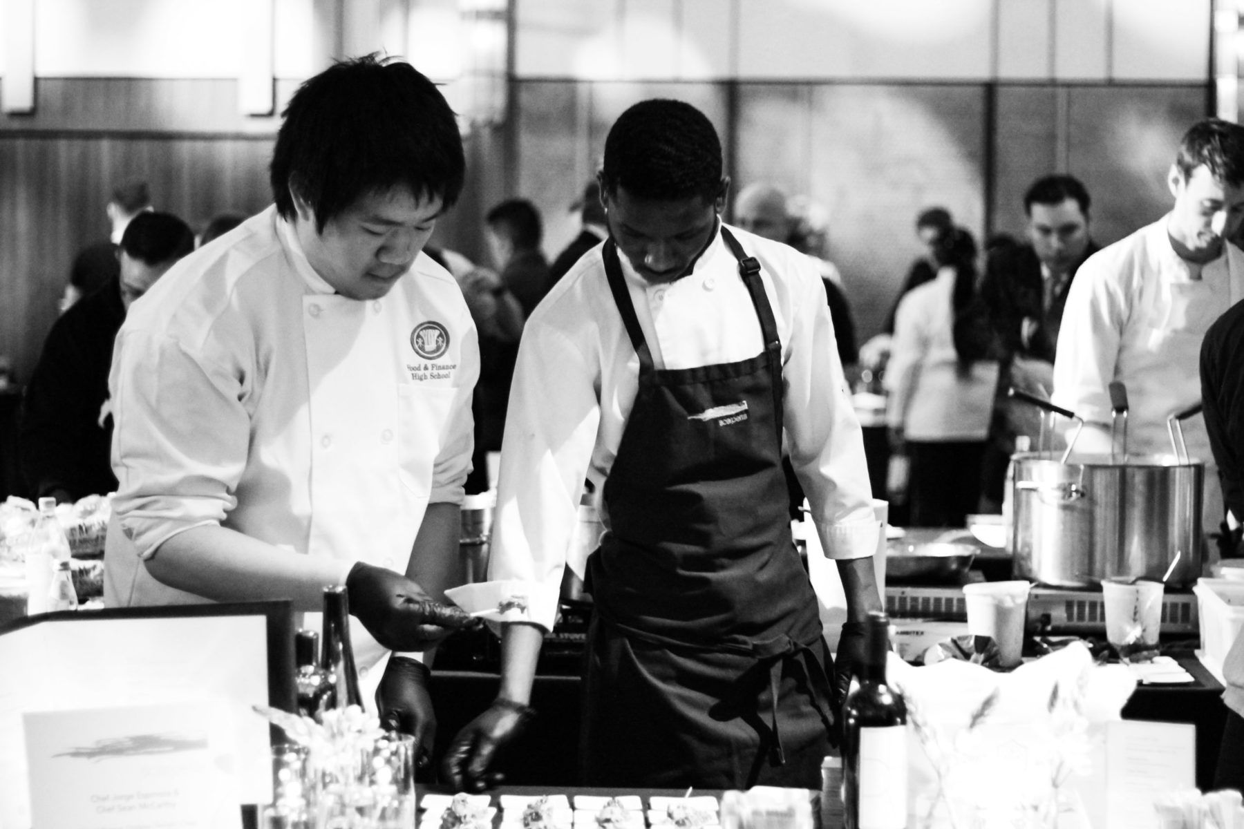 Charity event, two student cooking